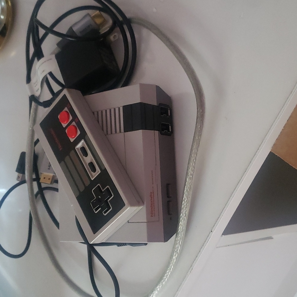 Mini Nintendo gaming system includes 30 internal original games. PRICE FIRM!